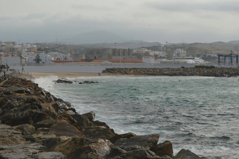 there is a large body of water by the shore