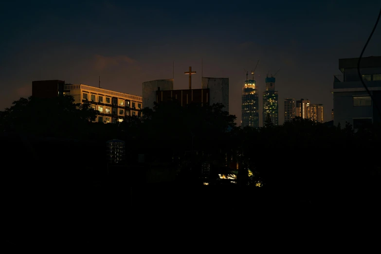 night sky view of skyscrs from afar