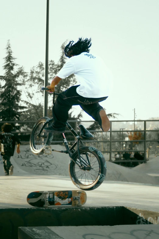 a man is doing tricks on his bicycle