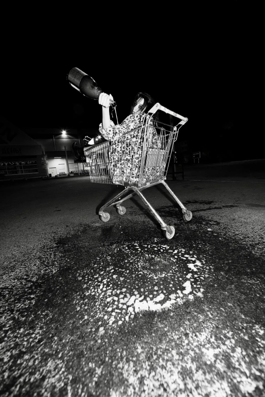 a shopping cart on the ground with a light