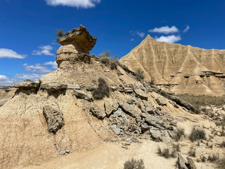 a large rock formation in the desert