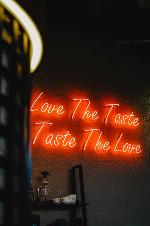 a sign on the wall of a restaurant with neon lights