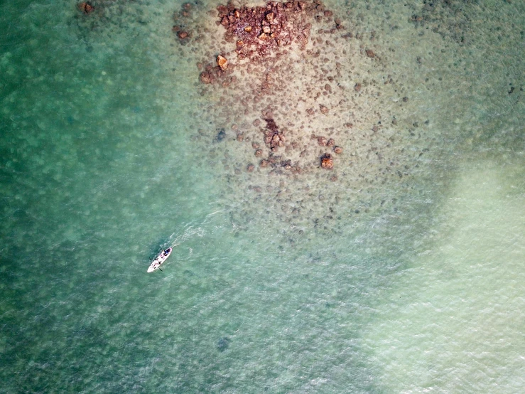 an aerial view of some sand that has been split into smaller shapes