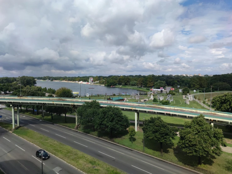 a highway near a large body of water