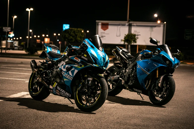 three motorcycles parked on the side of the road