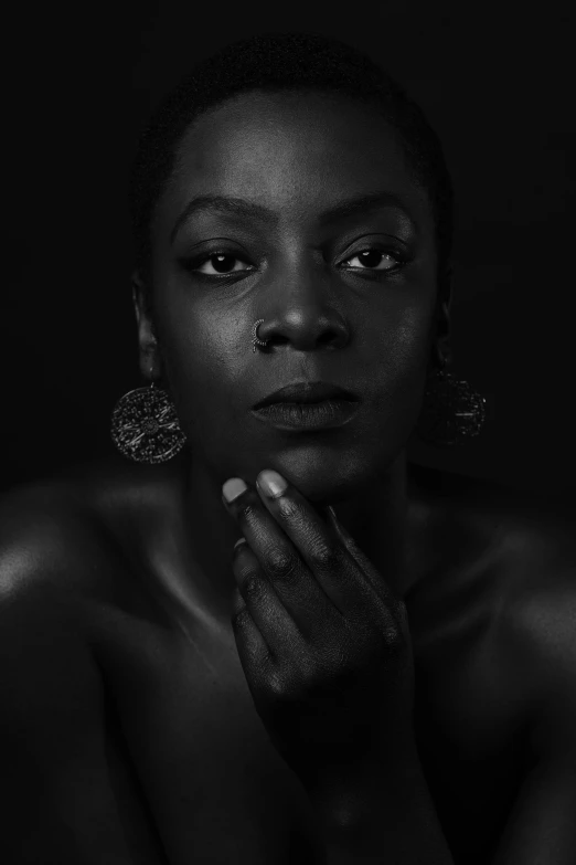 a women posing in black and white with a neutral skin tone