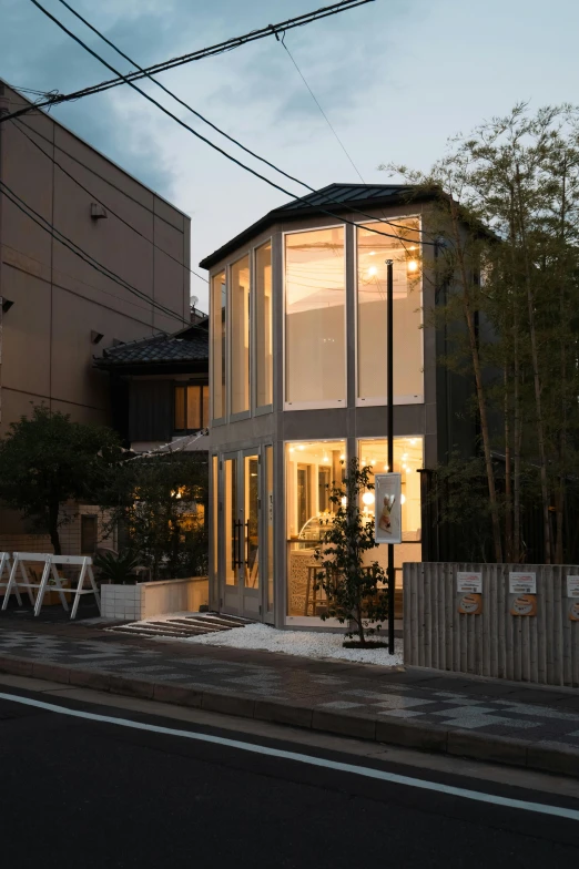 an empty corner of a street at dusk