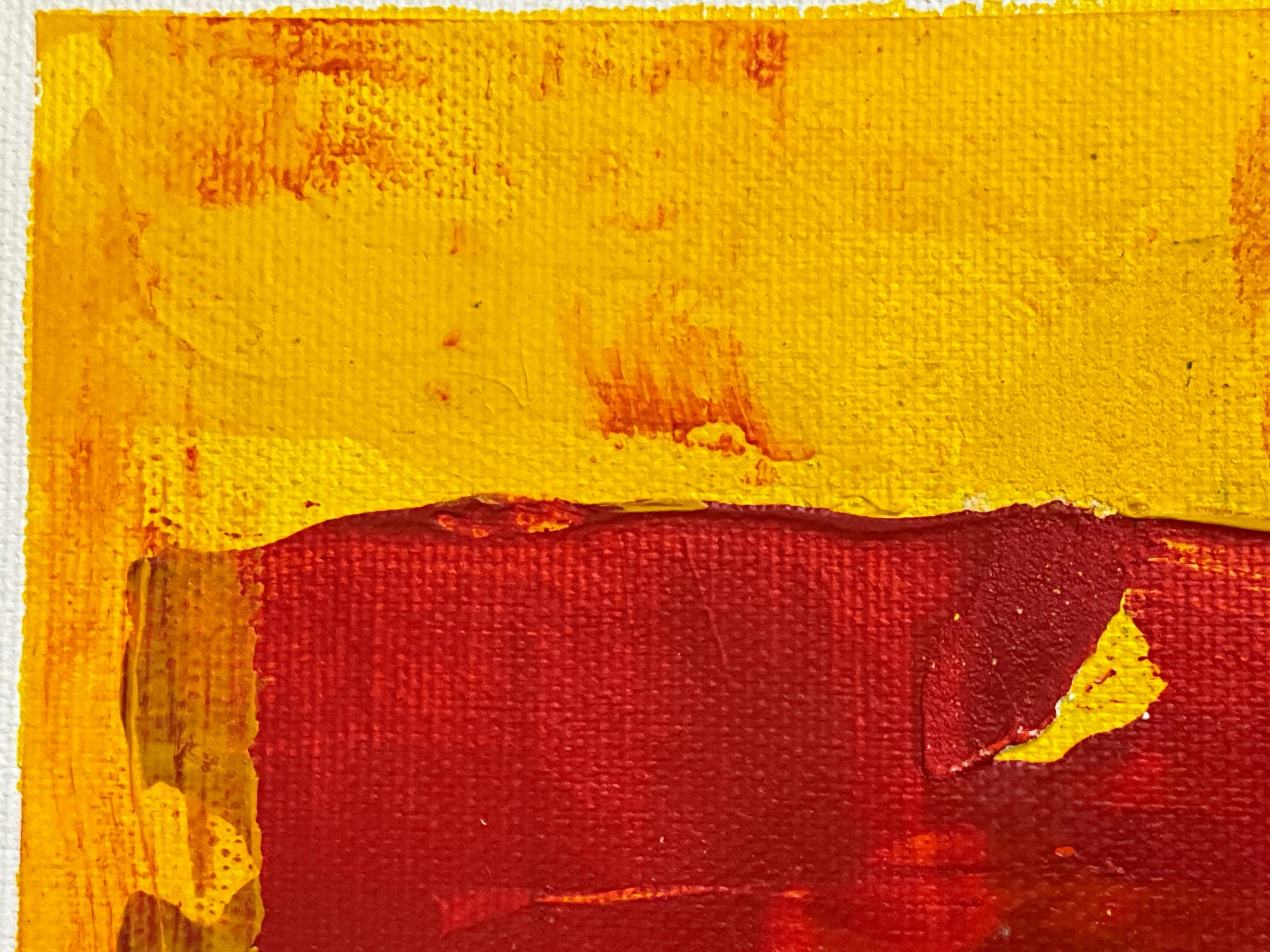 an abstract red and yellow painting on white paper