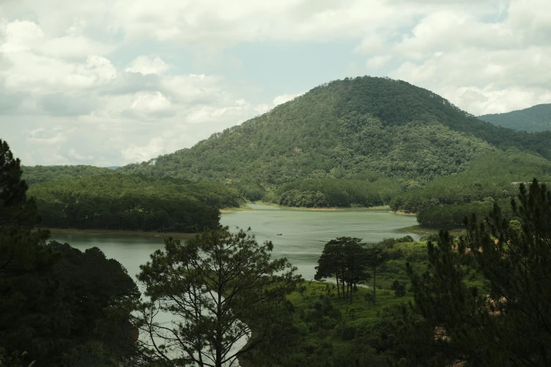 there are many hills with water and trees