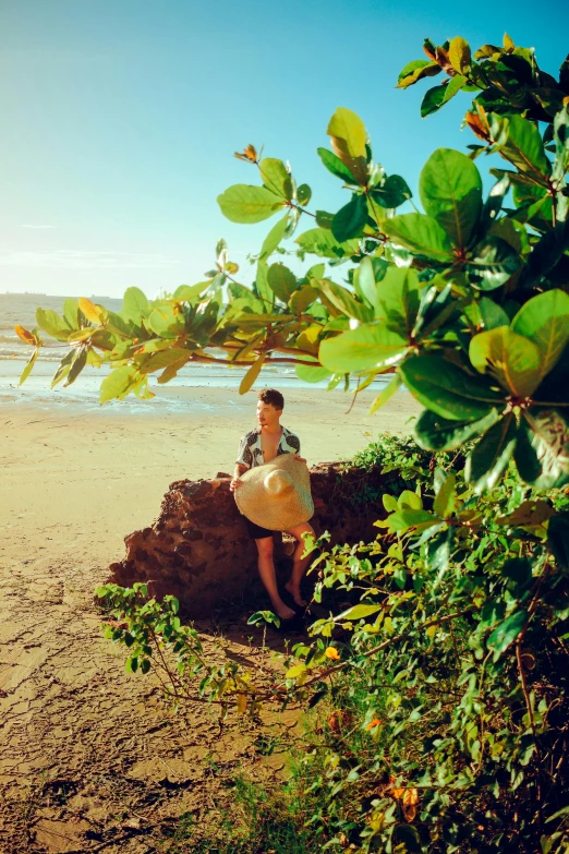 a person standing on a beach looking out at the ocean