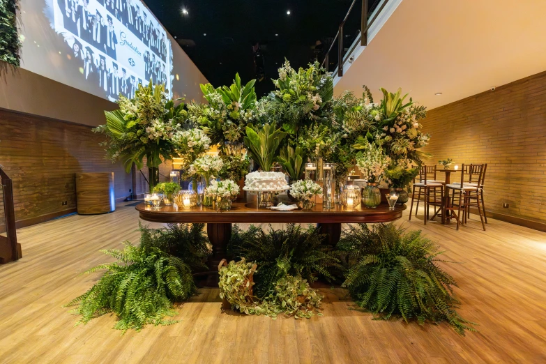 a wedding cake is sitting on a table