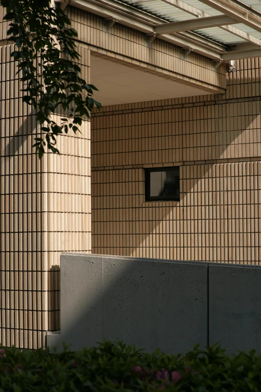 a lone bench outside of an enclosed area