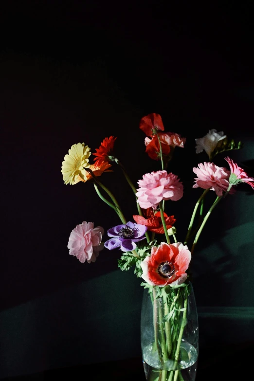 a vase filled with flowers on a table