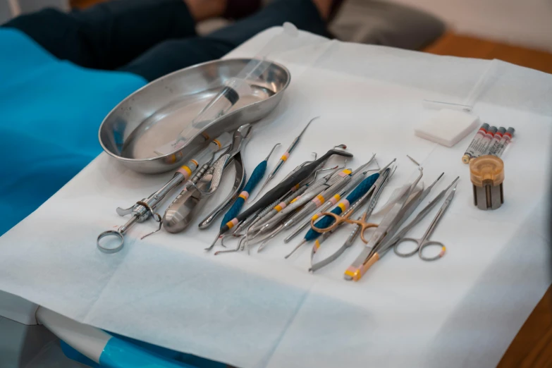 a table topped with a tray full of  equipment