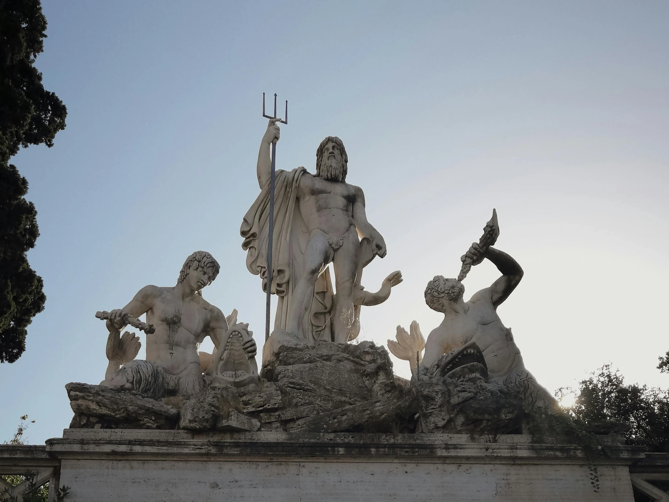 this is an image of a statue on top of a pillar