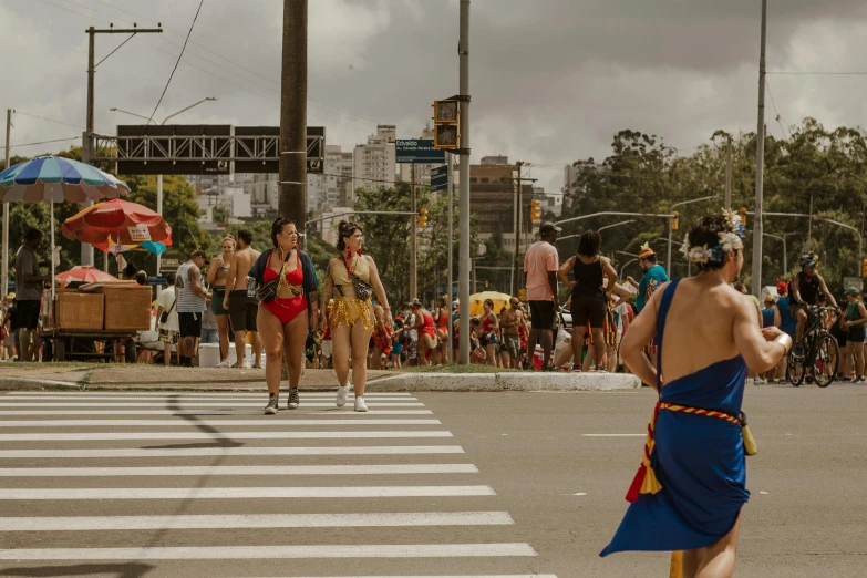 people are standing in the street near people on the street