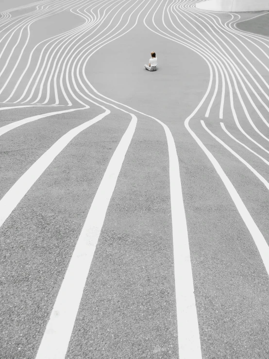 a person standing on the top of a parking lot