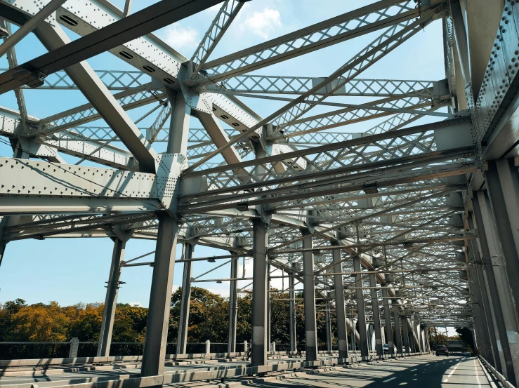 a group of steel structures sitting under a blue sky