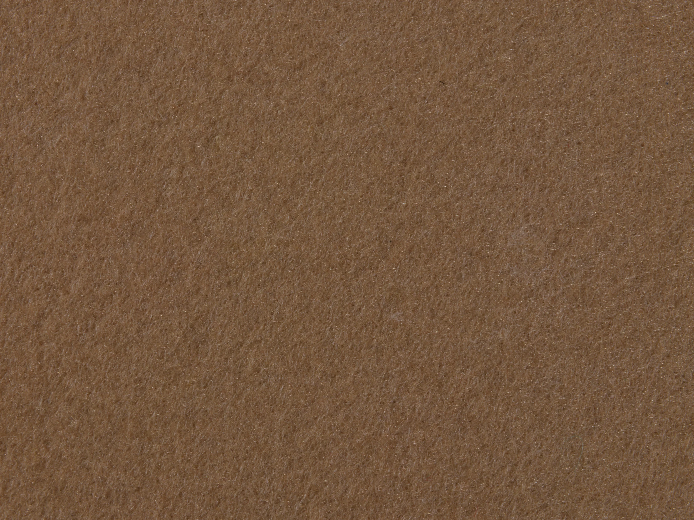 a brown background with some spots and small white circles