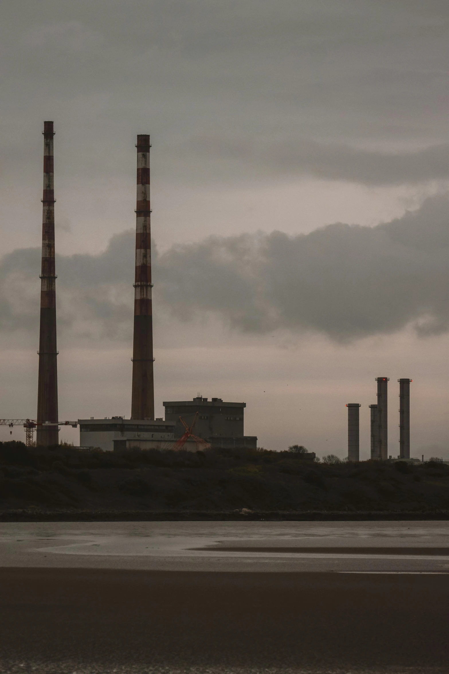 industrial power plant near a body of water