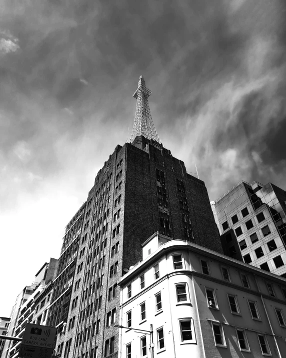 a city with very tall buildings and a clock tower