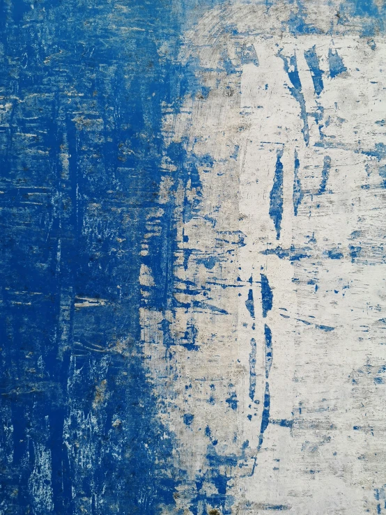 an old worn out blue and white surface