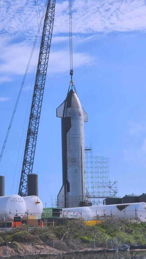 a space shuttle is mounted to the top of a building