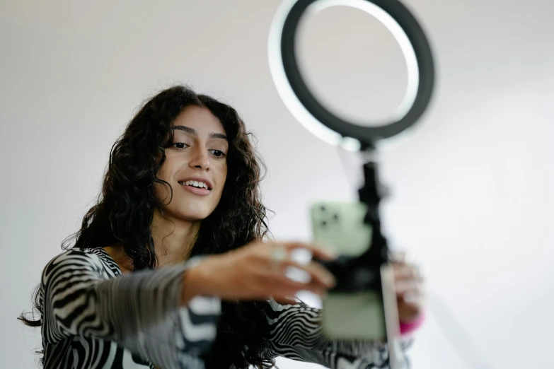 woman taking po with a selfie camera