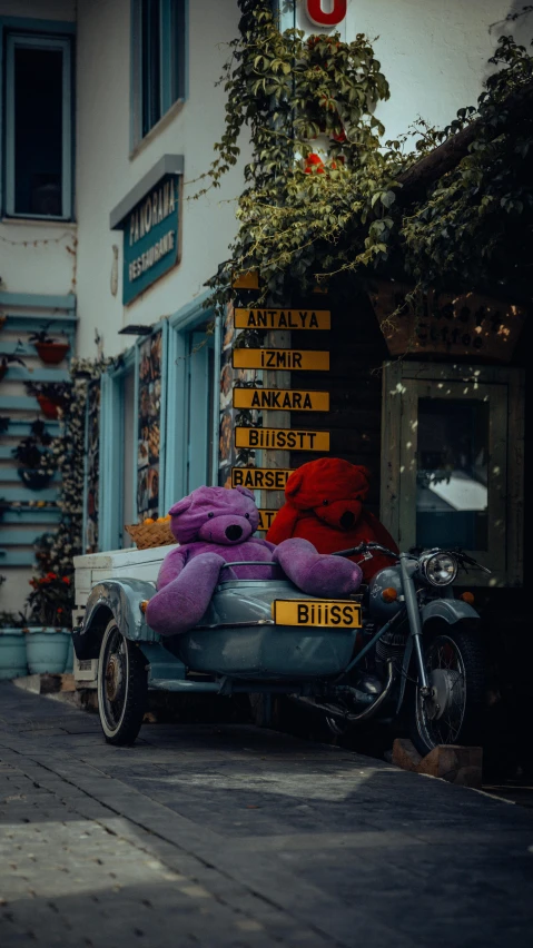 there is a large purple teddy bear in the trailer