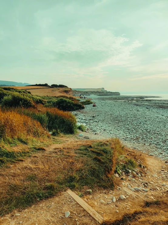 a view from a cliff overlooking the water