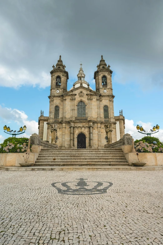 a church in an old, cobbled plaza