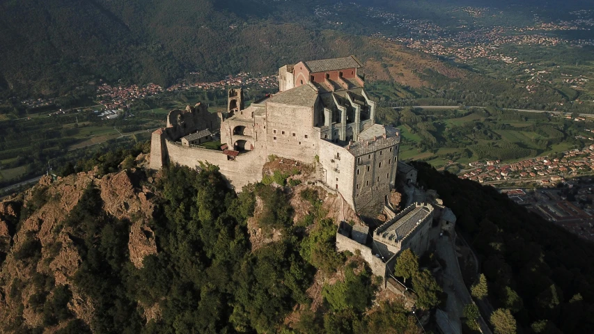this castle is situated high above the trees