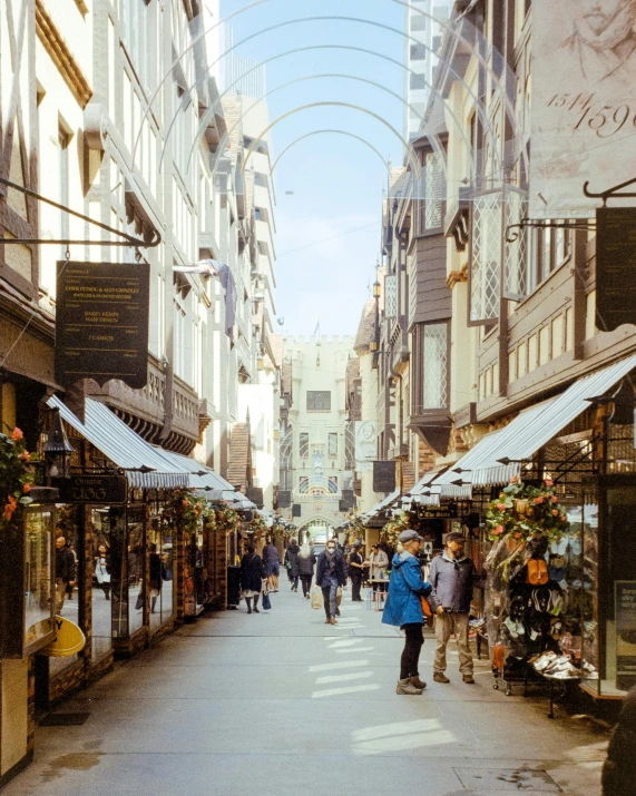 an empty street filled with shops on both sides of it