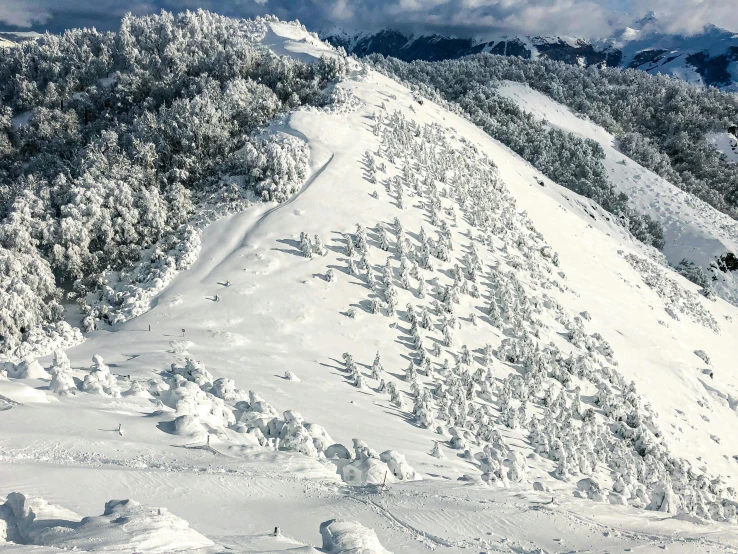 a person snowboarding on top of a mountain