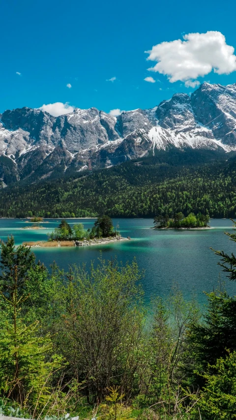 a scenic view of the mountains surrounding a lake