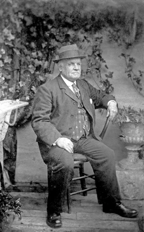 old black and white po of a man in a hat