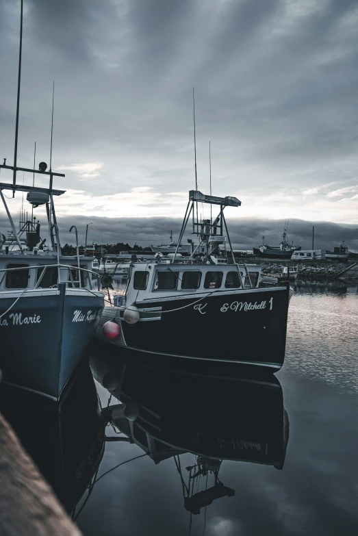 several boats that are sitting in the water