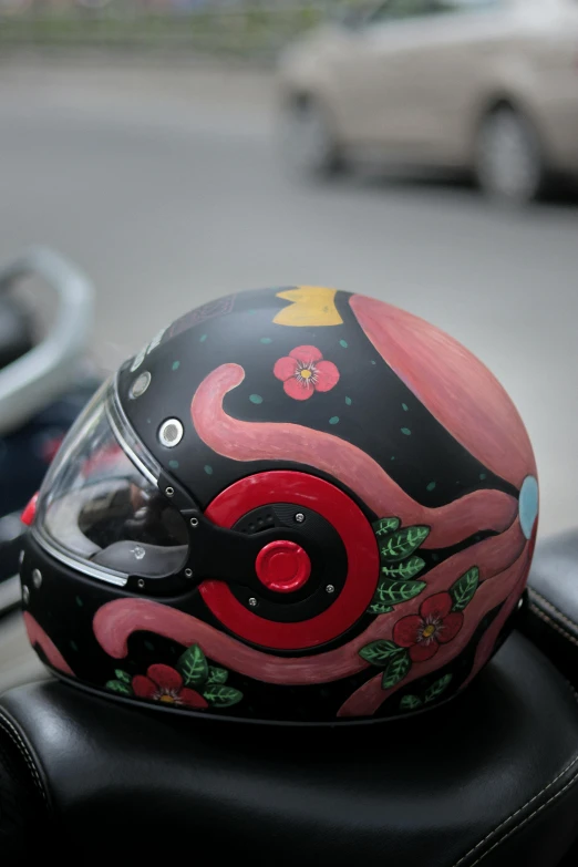 a helmet is resting on a motorcycle seat