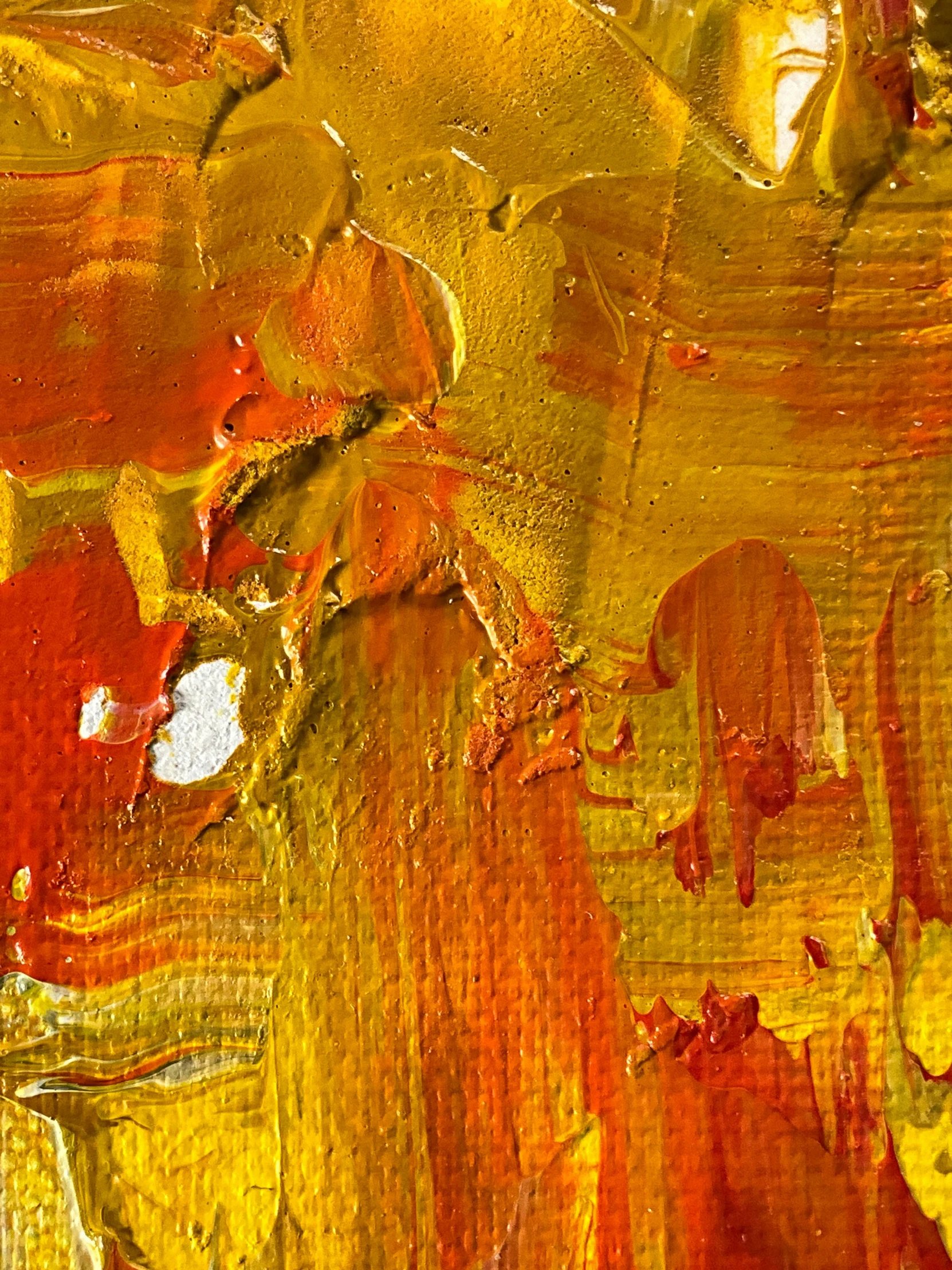 there is a painting with some yellow and red colors