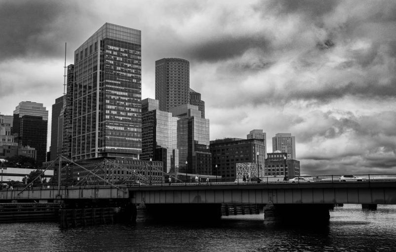 black and white pograph of rain storm approaching buildings