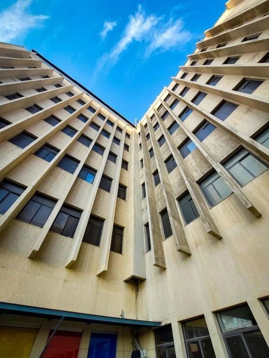 an upward s of the outside of two modern buildings