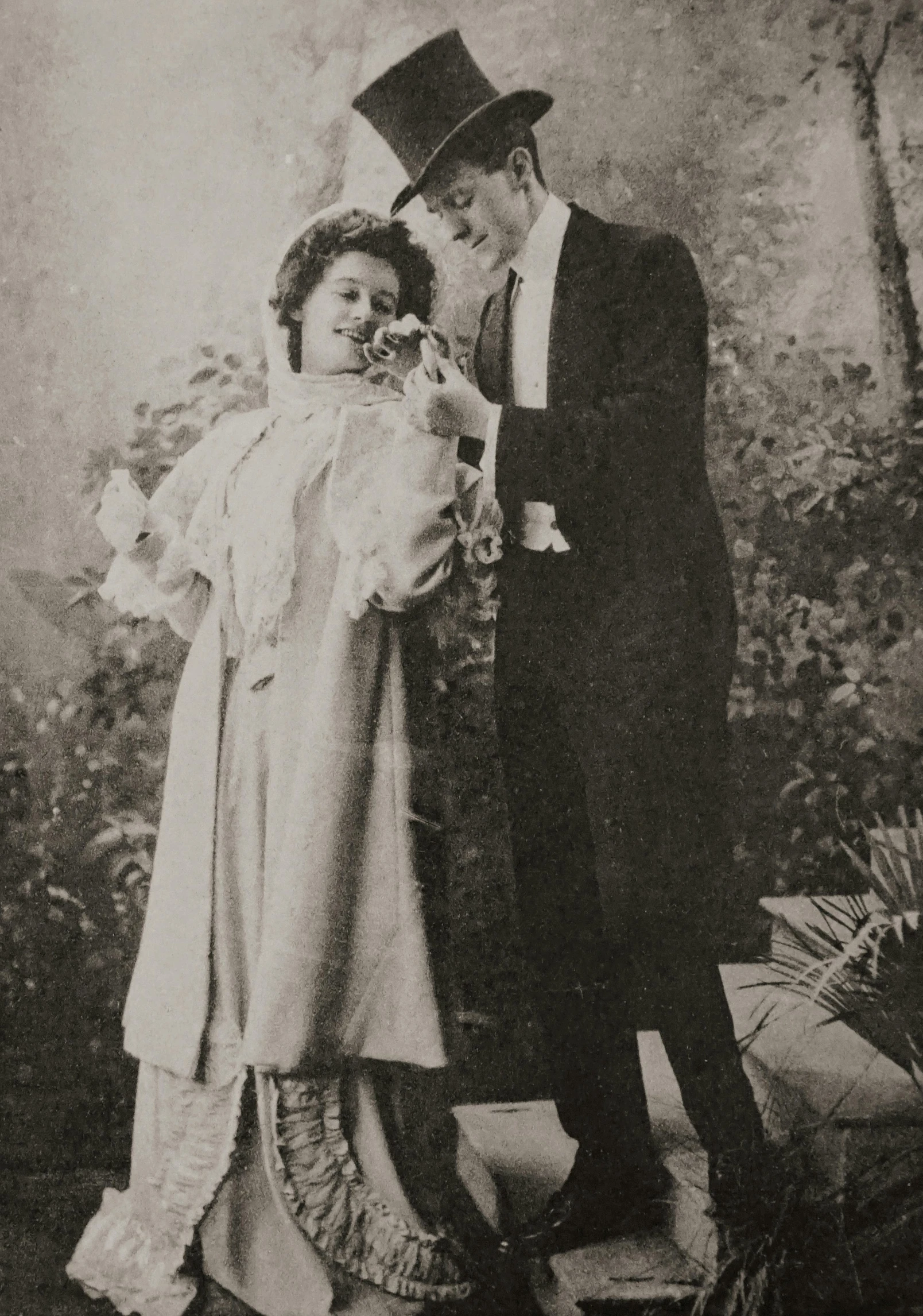 an old black and white po of two people