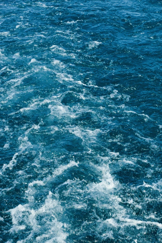 the view from a boat of the ocean with the water almost covering it