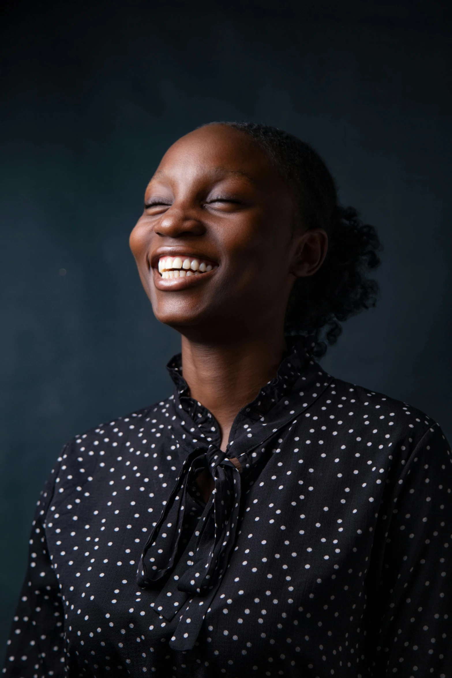 smiling black woman with a smile on her face