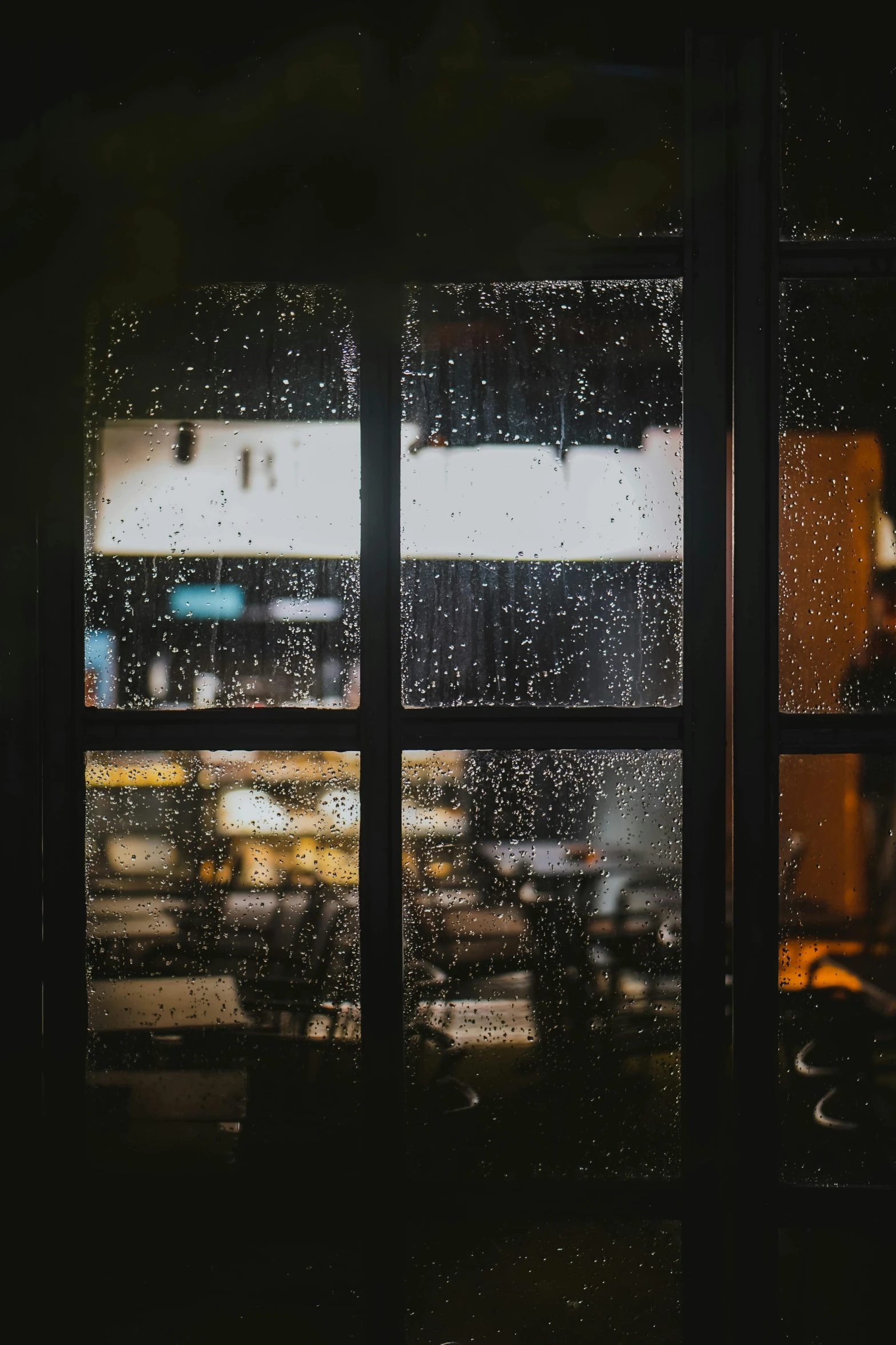 a bus is seen through a window on the other side