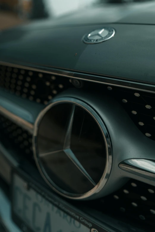 the front grill of an old vintage mercedes automobile