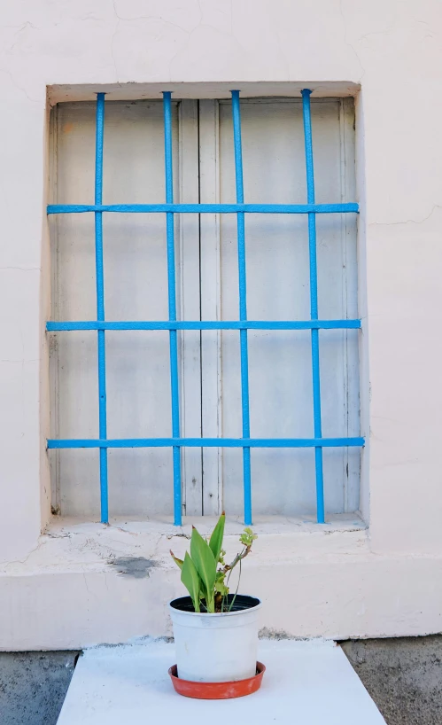 an object is positioned in front of a window