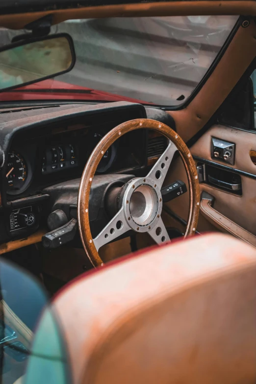 an older dashboard of a car with no steering wheel