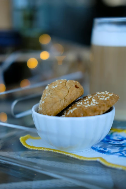 a close up of two cookies in a bowl