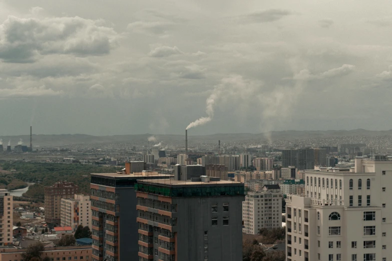 a city with tall buildings on either side of a river